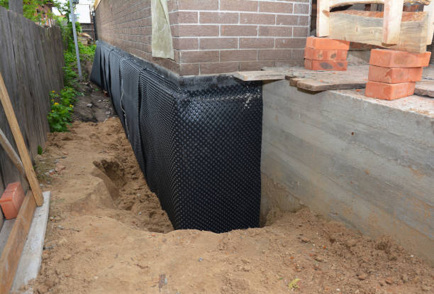 SJ Waterproofing Pros technician performing targeted Interior Drainage System assessment in Sandusky, MI